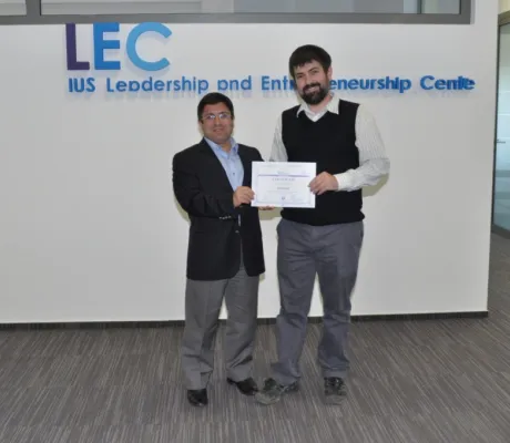The awarding ceremony of handing certificates to participants of the (LEC) course
