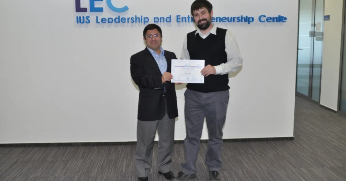 The awarding ceremony of handing certificates to participants of the (LEC) course